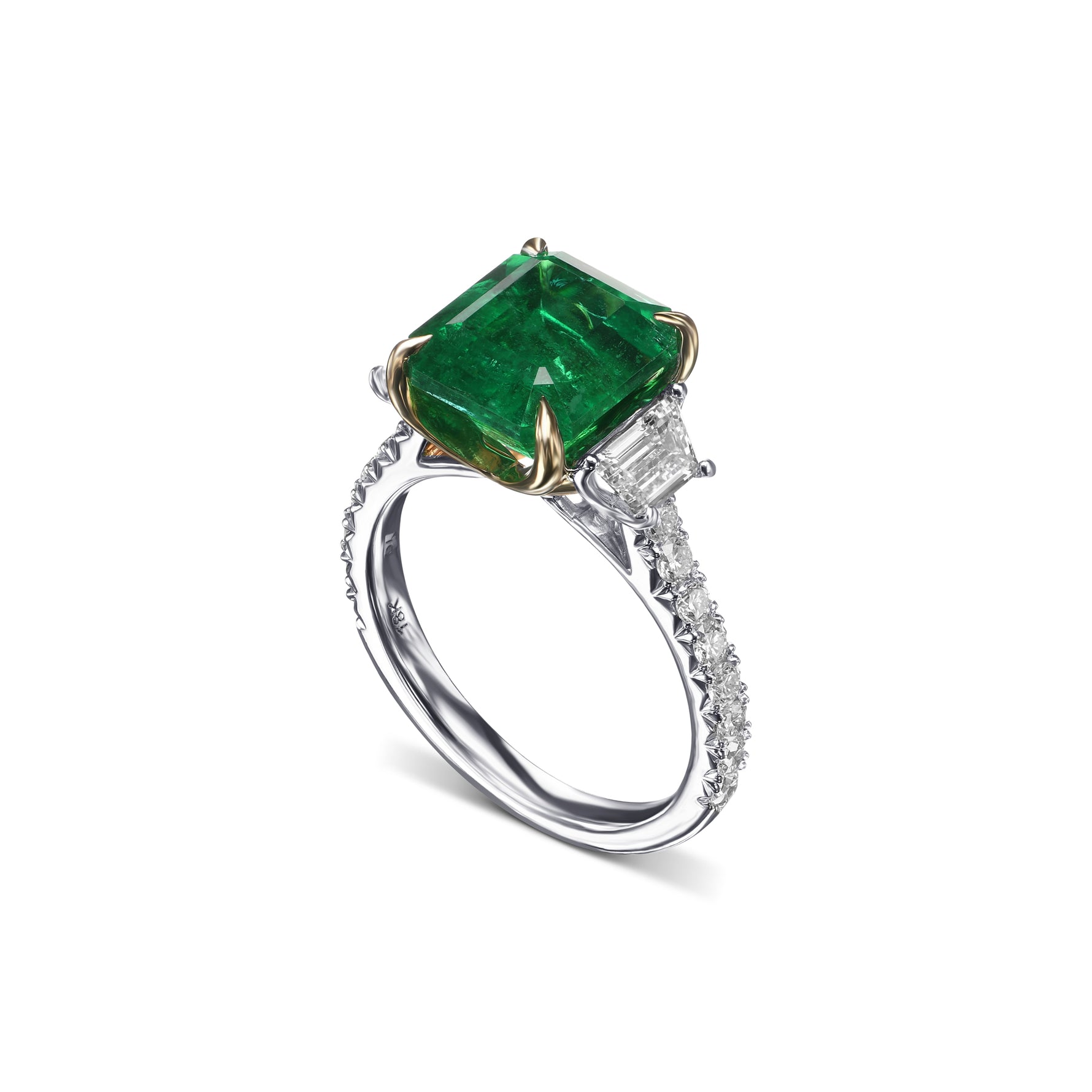 Emerald & Trapezoid Diamond Three-stone Ring