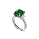 Emerald & Trapezoid Diamond Three-stone Ring