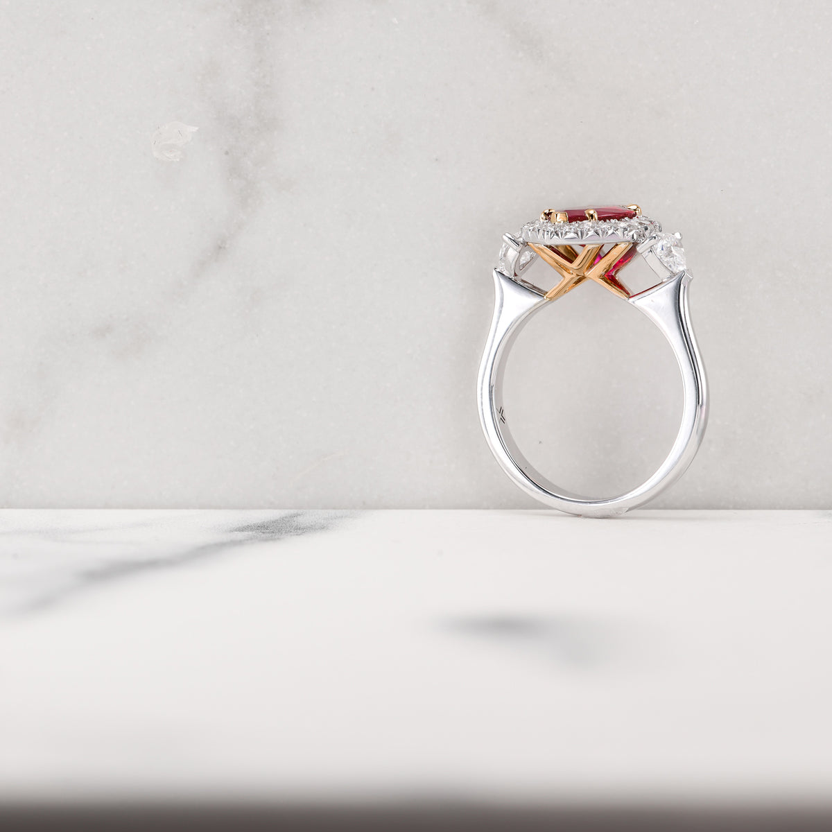 Burmese Marquise Ruby and Heart Diamond Three-Stone Halo Ring