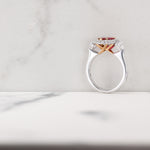 Burmese Marquise Ruby and Heart Diamond Three-Stone Halo Ring