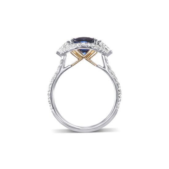 Royal Blue Cushion Sapphire & Triangle Diamond Halo Ring