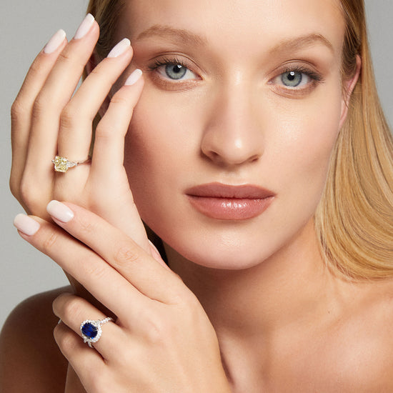 Royal Blue Cushion Sapphire & Triangle Diamond Halo Ring