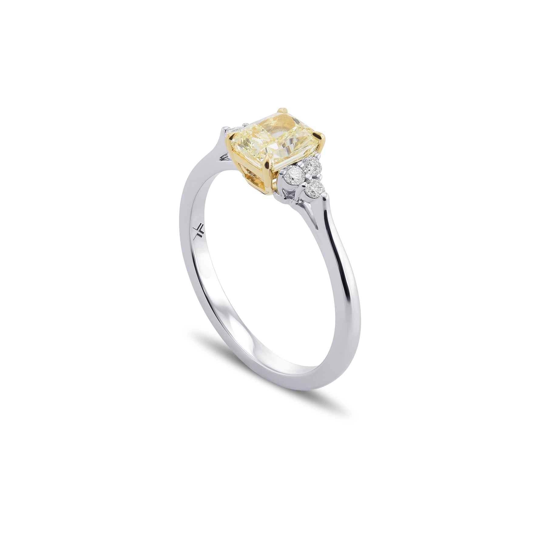 Light Yellow Radiant Side Stone Diamond Ring