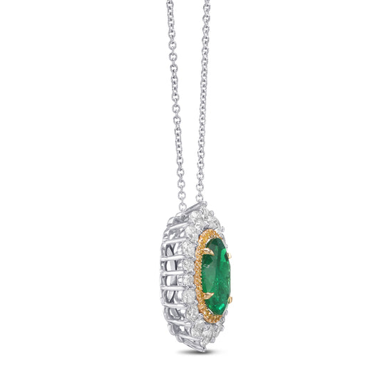 Muzo Oval Emerald and Diamond Double Halo Pendant.