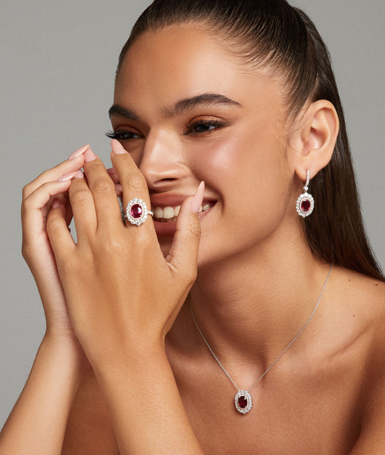 Cushion Mozambique Ruby and Diamond Double Halo Ring