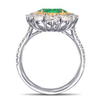 Oval Muzo Emerald and Diamond Double Halo Ring