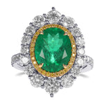 Oval Muzo Emerald and Diamond Double Halo Ring
