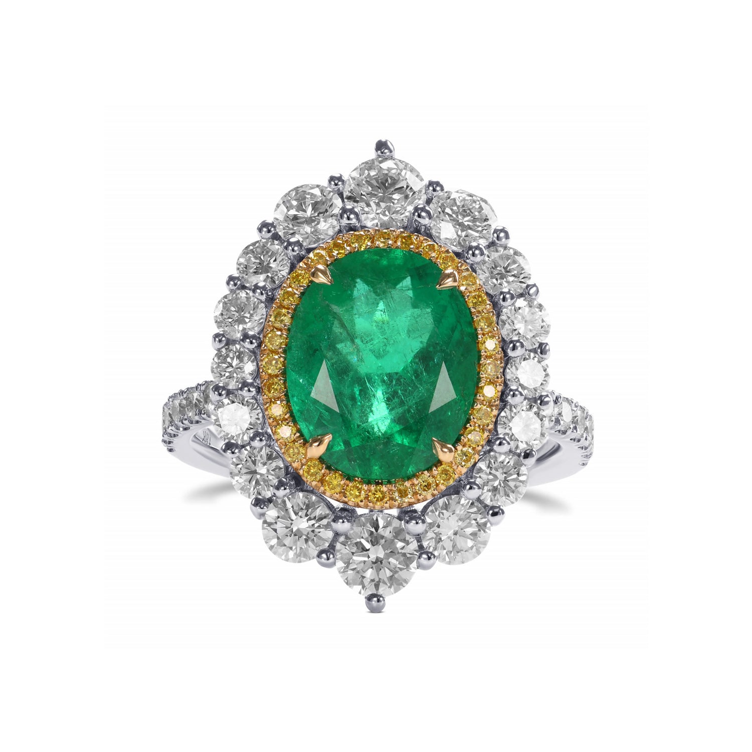 Oval Muzo Emerald and Diamond Double Halo Ring