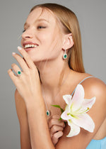 Oval Muzo Emerald and Diamond Double Halo Ring