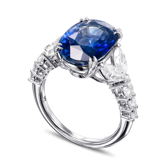 Royal Blue Oval Sapphire and Diamond Side Stone Ring