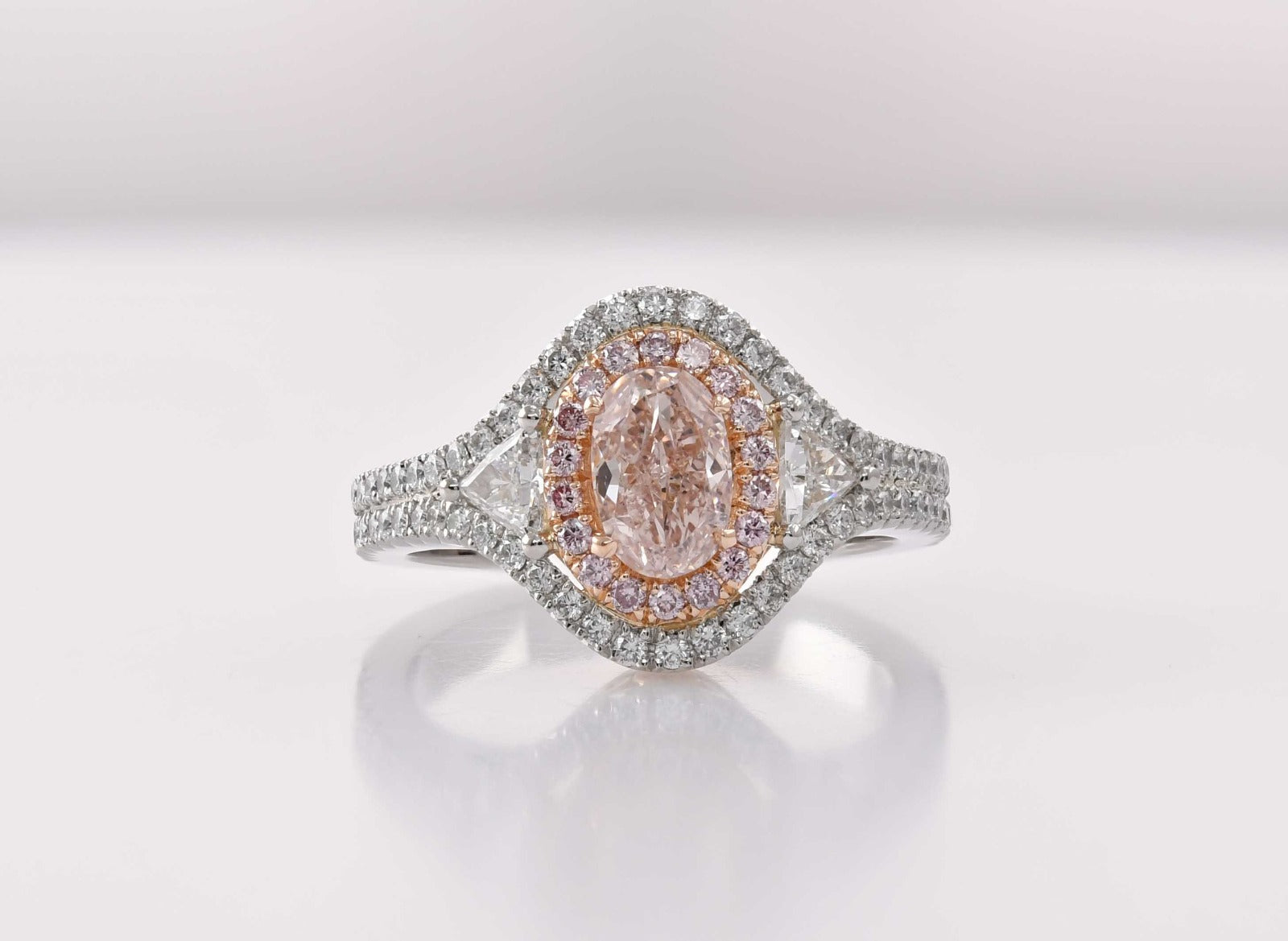 Fancy Pink Brown Oval Three-Stone Halo Diamond Ring