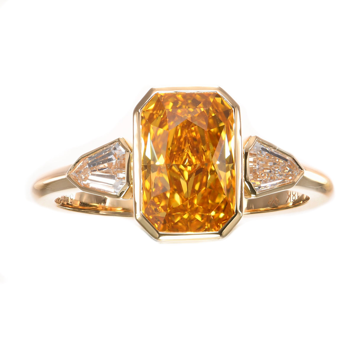 Fancy Deep Orangy Yellow Radiant & Shield Diamond Three-stone Ring