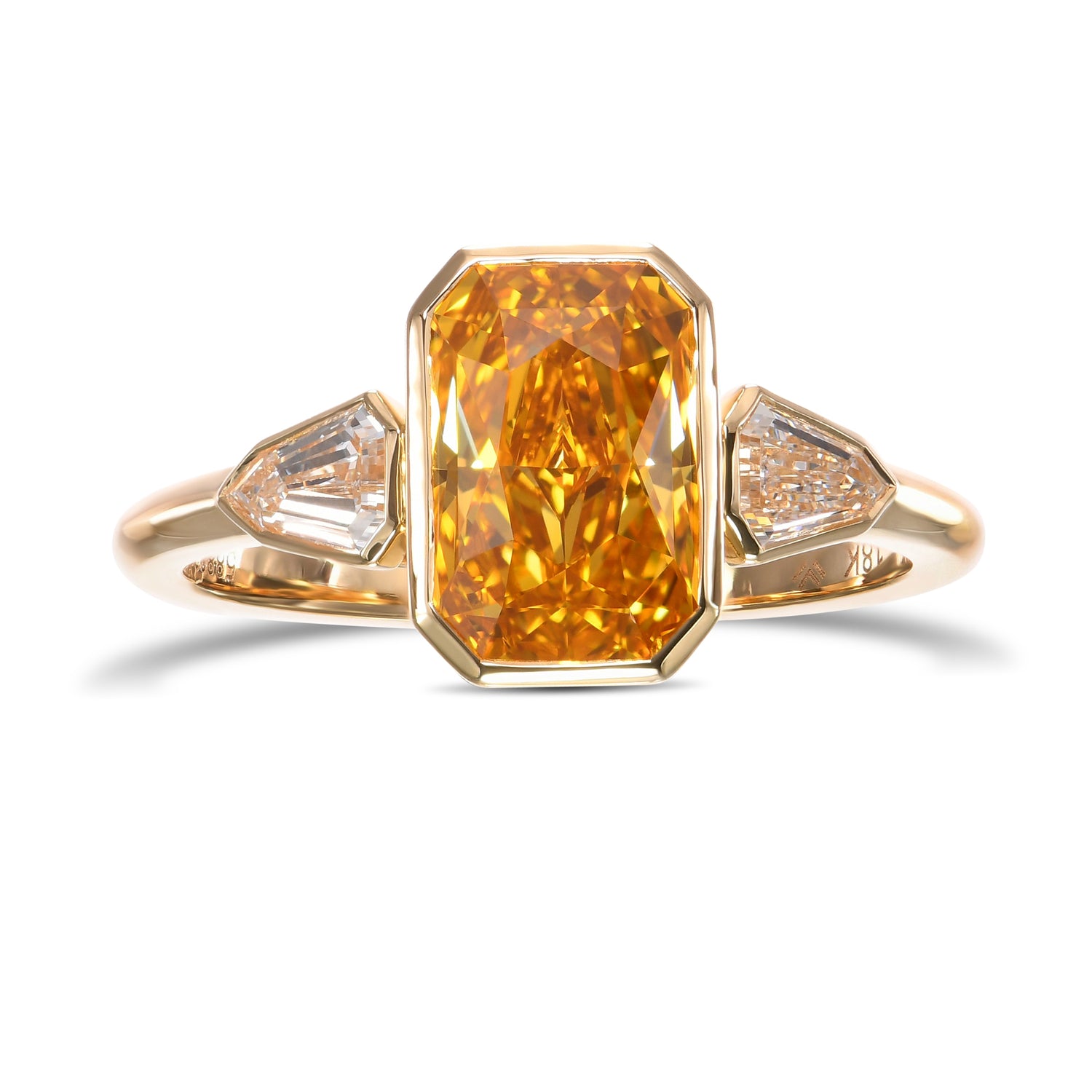 Fancy Deep Orangy Yellow Radiant & Shield Diamond Three-stone Ring