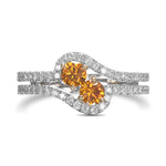 Fancy Deep Brownish Orangy Yellow Rounds, Two-stone Diamond Cross-over Ring