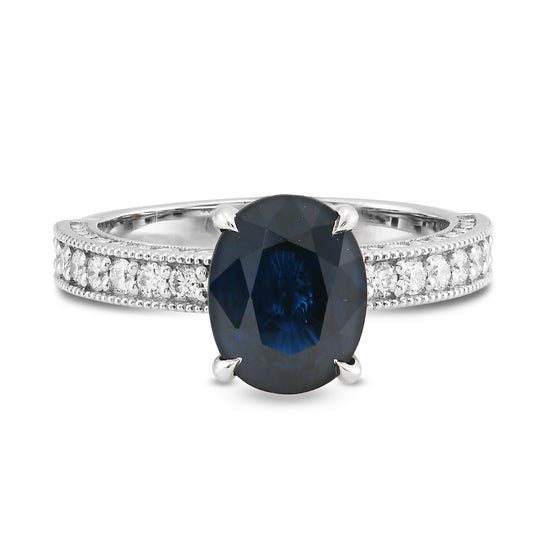 Oval Sapphire Solitaire Side Stone Ring