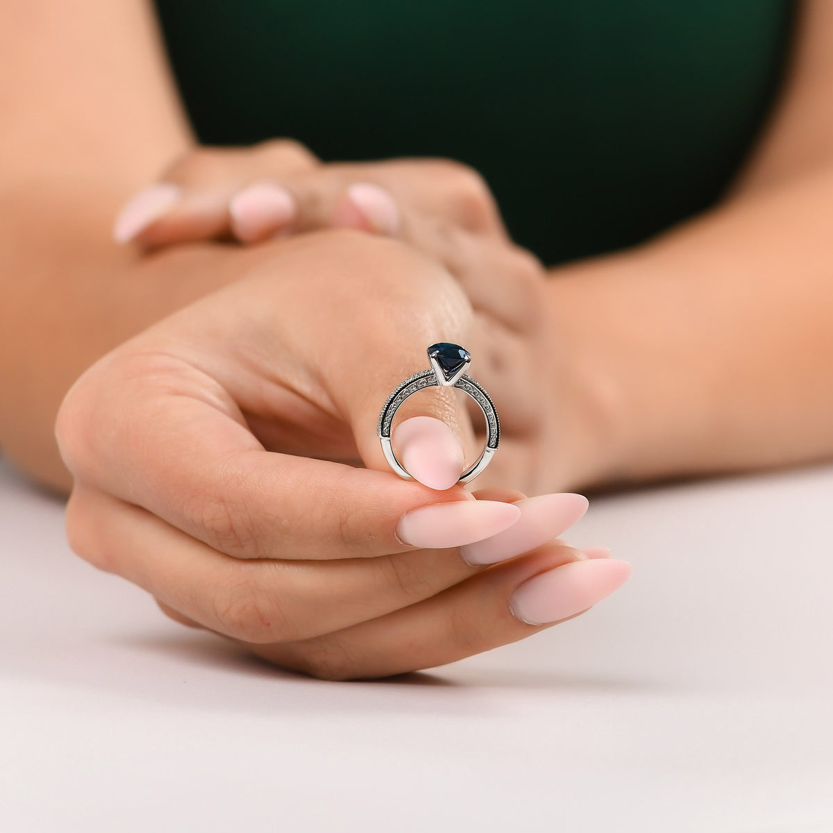 Oval Sapphire Solitaire Side Stone Ring