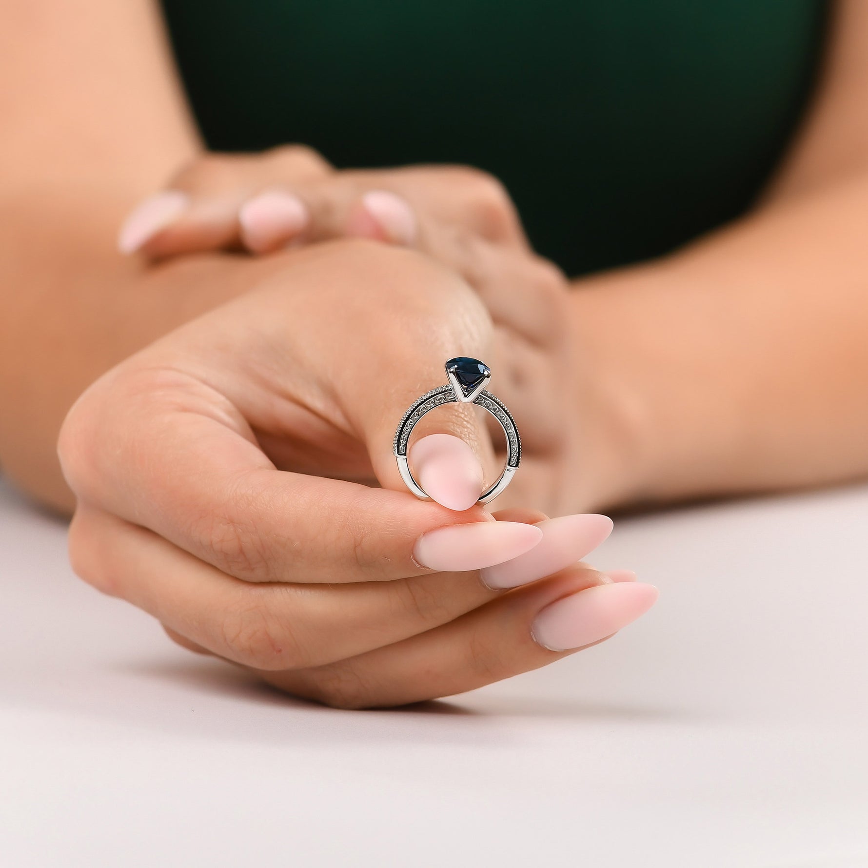 Oval Sapphire Solitaire Side Stone Ring