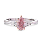 Fancy Intense Pink Pear & Diamond Three-stone Ring