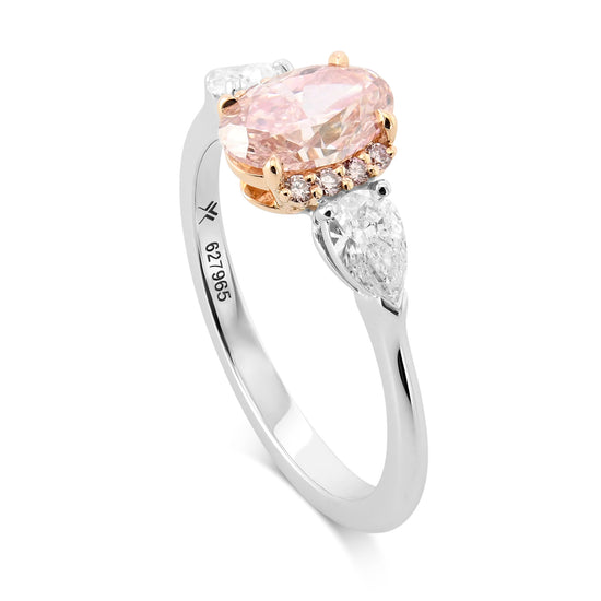 Fancy Orangy Pink Oval Diamond Semi-Halo Three-Stone Ring
