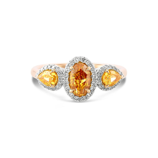Fancy Vivid Yellowish Orange Three-stone Halo Diamond Ring