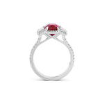 Oval Ruby Three-stone Halo Ring