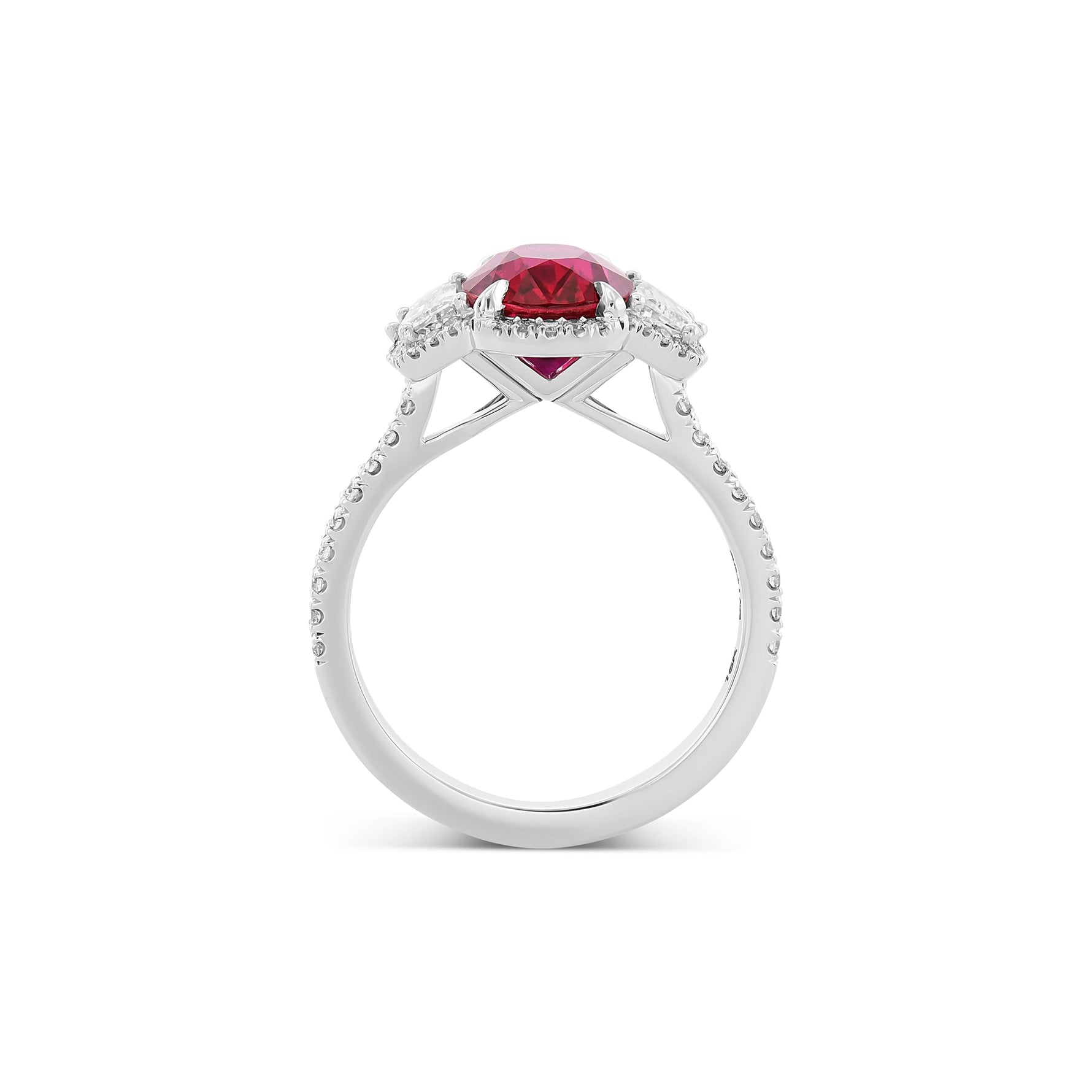 Oval Ruby Three-stone Halo Ring