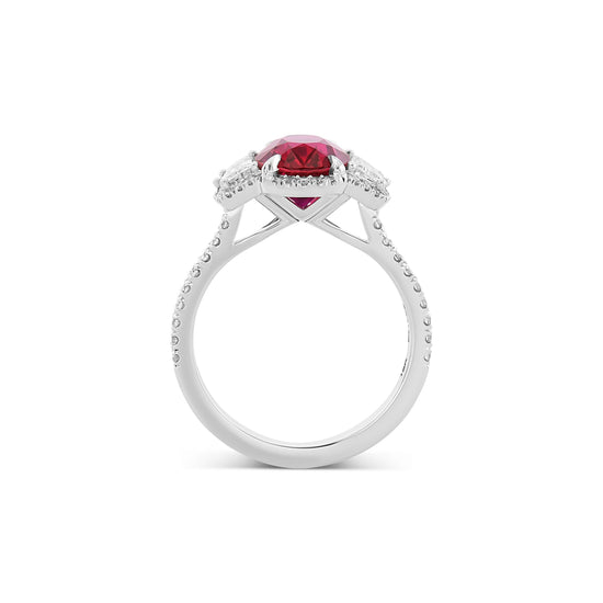 Oval Ruby Three-stone Halo Ring