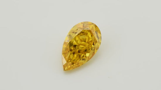 0.61 Carat Fancy Vivid Yellow Orange Pear Diamond VS1 GIA