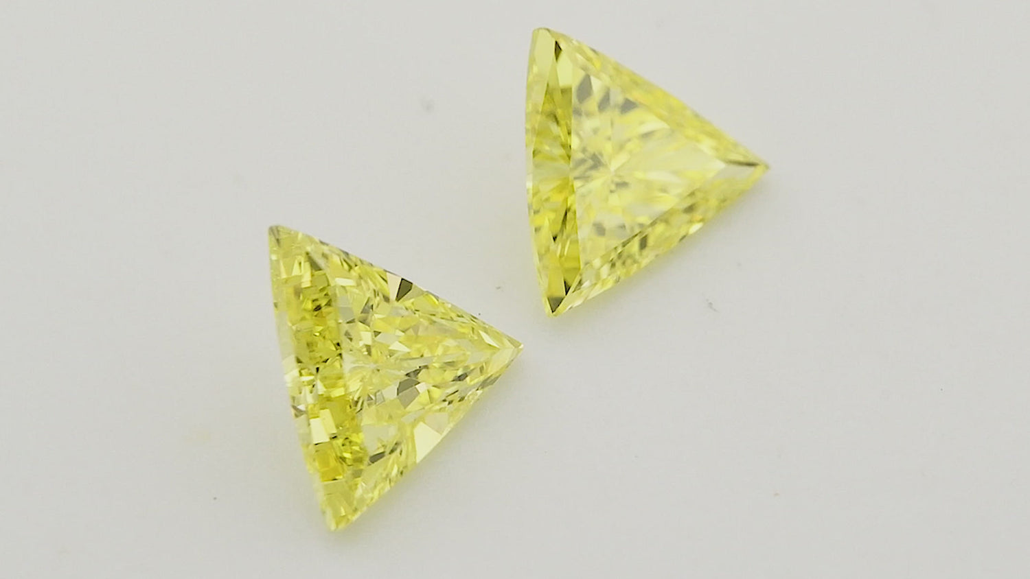 0.41 Carat Fancy Vivid Yellow Triangle Diamonds (VS2)