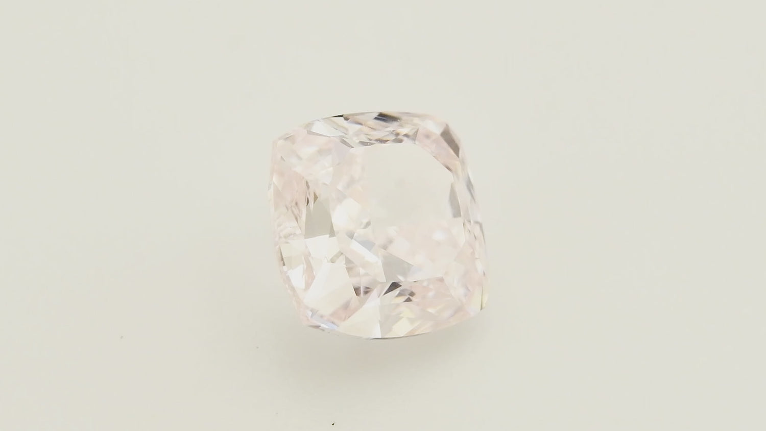 0.86 Carat Fancy Light Orangy Pink Cushion Diamond VVS1 GIA