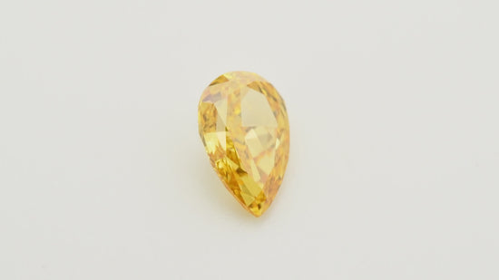 0.51 Carat Fancy Vivid Yellow Orange Pear Diamond VS1 GIA