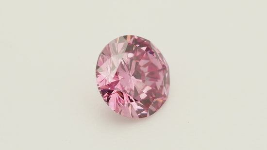 0.56 Carat Fancy Vivid Purplish Pink Round Diamond SI2 GIA