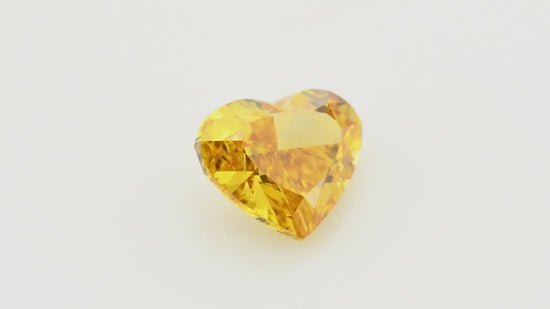 0.72 Carat Fancy Vivid Yellow Orange HEART Diamond VS2 GIA