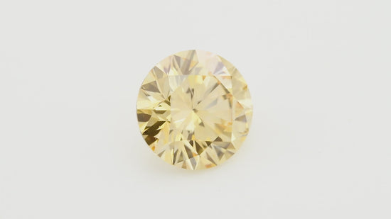 0.55 Carat Fancy Orange Yellow Round Brilliant Diamond VS2 GIA
