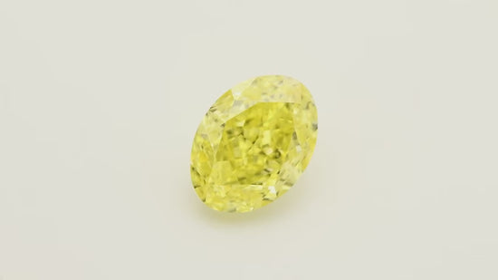 0.82 Carat Fancy Intense Yellow Oval Diamond VVS2 GIA