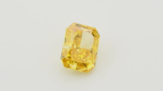 0.33 Carat Fancy Vivid Yellow Orange Radiant Diamond VVS1 GIA