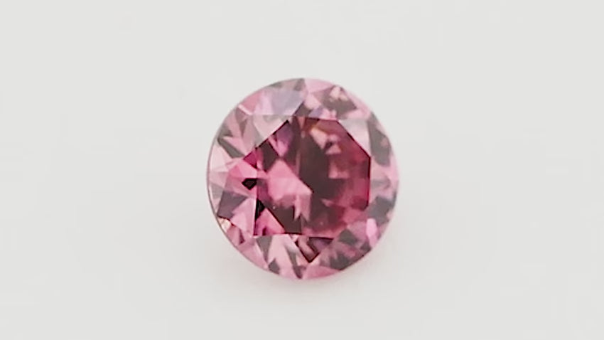 0.08 Carat Fancy Vivid Pink Round Brilliant Diamond (VS2) GIA