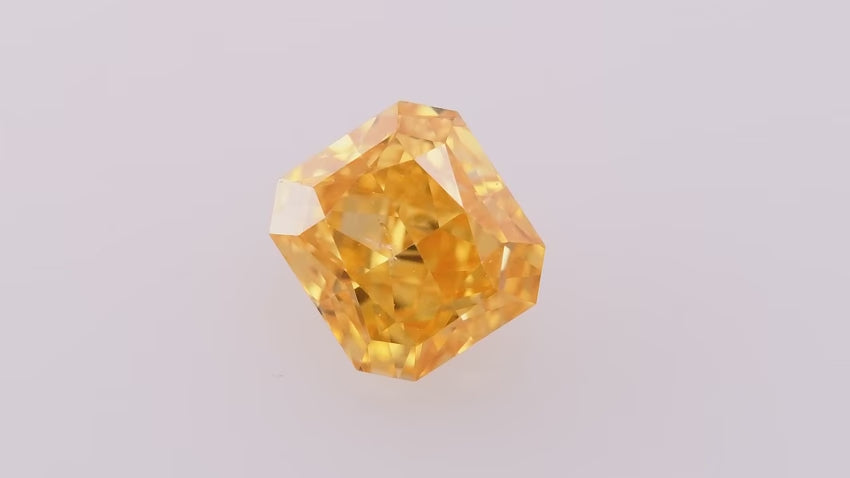 0.18 Carat Fancy Intense Yellow Orange Radiant Diamond SI2 GIA