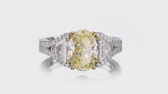 Light Yellow Oval Three Stone Diamond Ring