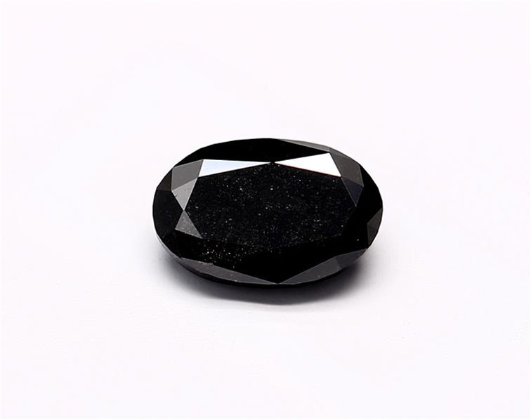 0.81 Carat Natural Black Oval Diamond GIA