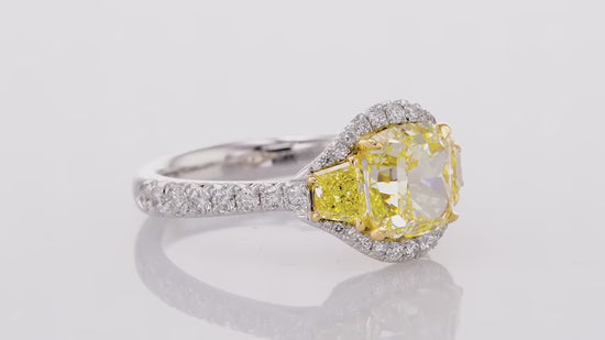 Fancy Yellow Cushion Three-stone Halo Diamond Ring