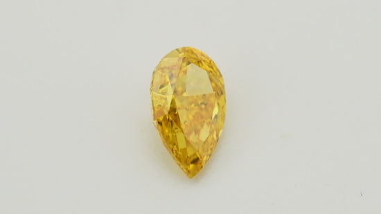 0.61 Carat Fancy Vivid Yellow Orange Pear Diamond VS1 GIA