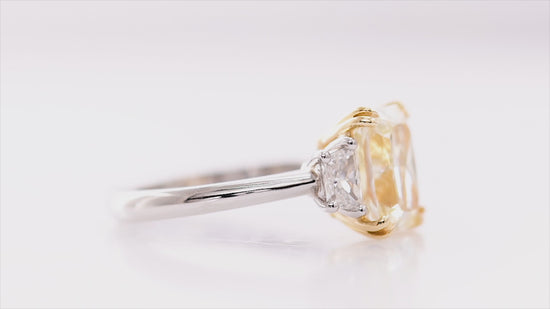 Light Yellow Y-Z Radiant Three-stone Diamond Ring