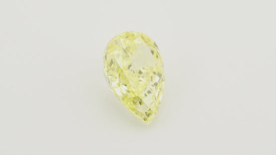 0.83 Carat Fancy Yellow Pear Diamond VVS2 GIA