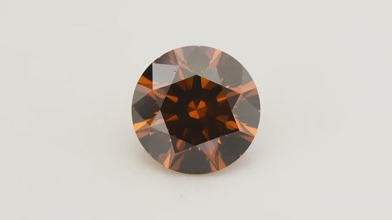 0.85 Carat Fancy Deep Brownish Orange Round Diamond I1 GIA