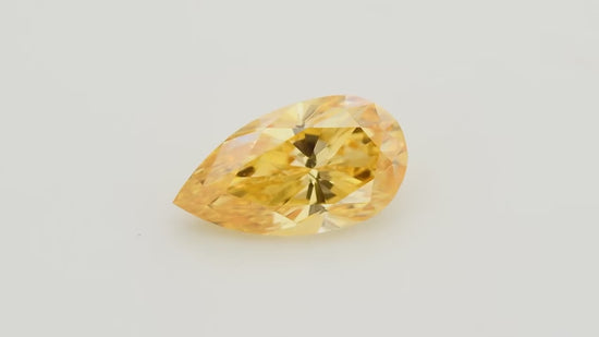 0.55 Carat Fancy Vivid Yellow Orange Pear Diamond SI1 GIA