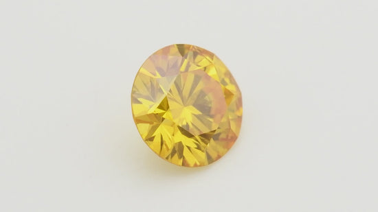 0.33 Carat Fancy Intense Orange Yellow Round Diamond VVS2 GIA