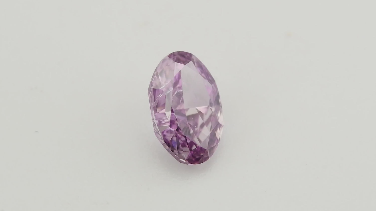 0.30 Carat Fancy Intense Pinkish Purple Oval Diamond SI2 GIA