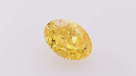 0.50 Carat Fancy Intense Orange Yellow Oval Diamond SI2 GIA