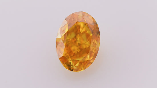 0.84 Carat Fancy Vivid Yellowish Orange Oval Diamond VS2 GIA